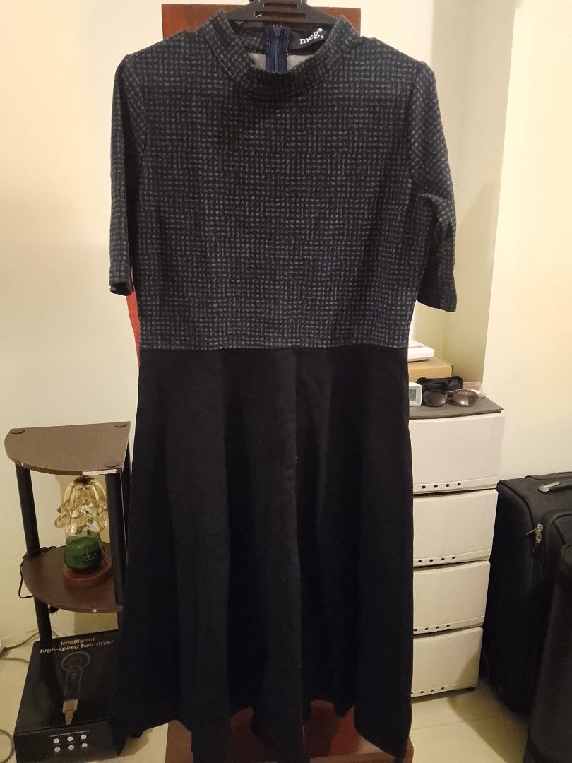 Meg dark grey houndstooth pattern midi dress size M (Category: Dresses) located in Quezon City. Submitted by macieee39997 (Listing ID 1465867781, Image 1). Description: - Brand: Meg - Size: M (tag on collar) - Color/Pattern: Dark grey with houndstooth patterned top and solid black skirt - Style: Midi dress with half sleeves and high neckline. A-style skirt - Closure: Back zipper - Condition: Clean fabric, well cared for.