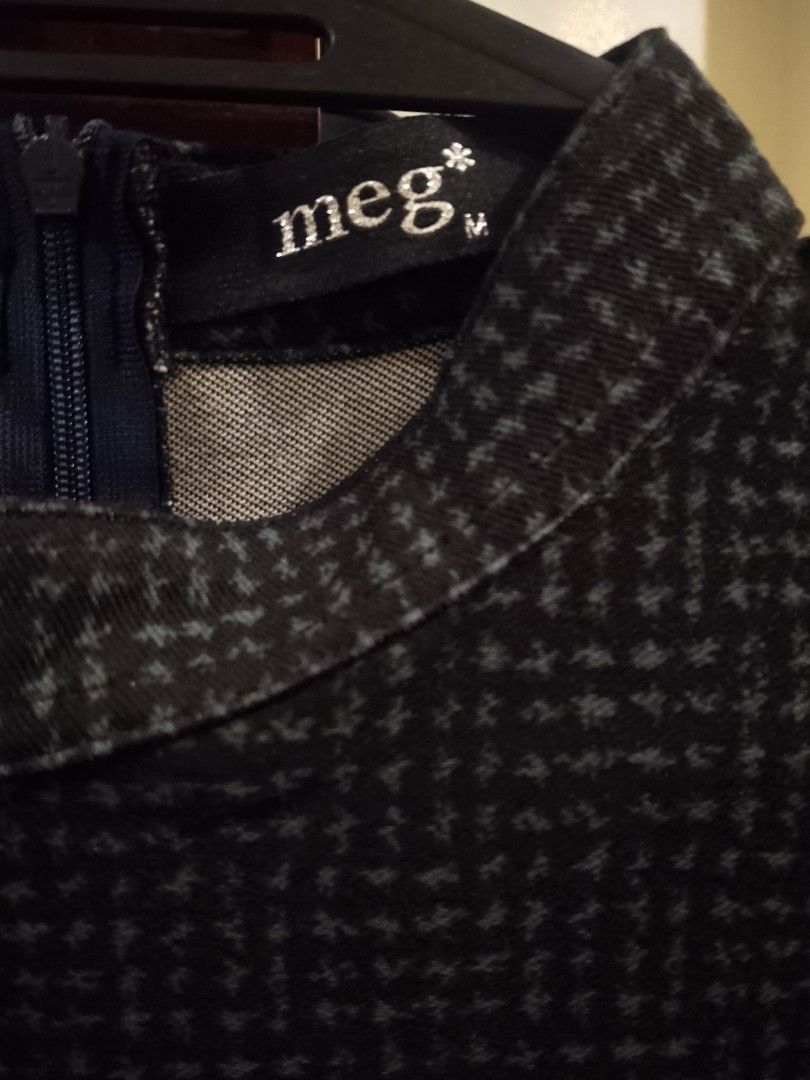 Meg dark grey houndstooth pattern midi dress size M (Category: Dresses) located in Quezon City. Submitted by macieee39997 (Listing ID 1465867781, Image 3). Description: - Brand: Meg - Size: M (tag on collar) - Color/Pattern: Dark grey with houndstooth patterned top and solid black skirt - Style: Midi dress with half sleeves and high neckline. A-style skirt - Closure: Back zipper - Condition: Clean fabric, well cared for.