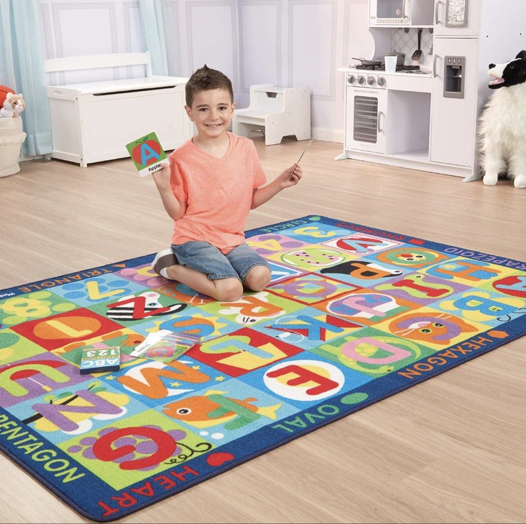 Melissa & Doug Jumbo ABC-123 Educational Play Rug (Category: Infant Playtime) located in Quezon City. Submitted by racelway (Listing ID 1465872200, Image 2). Description: - Authentic Melissa & Doug jumbo learning rug featuring ABCs, numbers, shapes, and fun pictures - Comes with attached ring-bound activity cards for interactive learning games - Clean, bright, and vibrant design that kids love playing on - Perfect addition to any playroom, nurser
