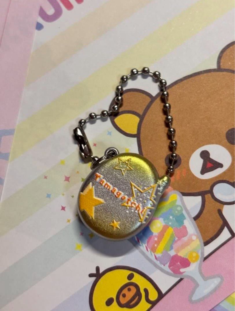 Memetchi Tamagotchi Keychain (Category: Vintage Collectibles) located in San Juan City. Submitted by glitznpops.ph (Listing ID 1465953134, Image 2). Description: .