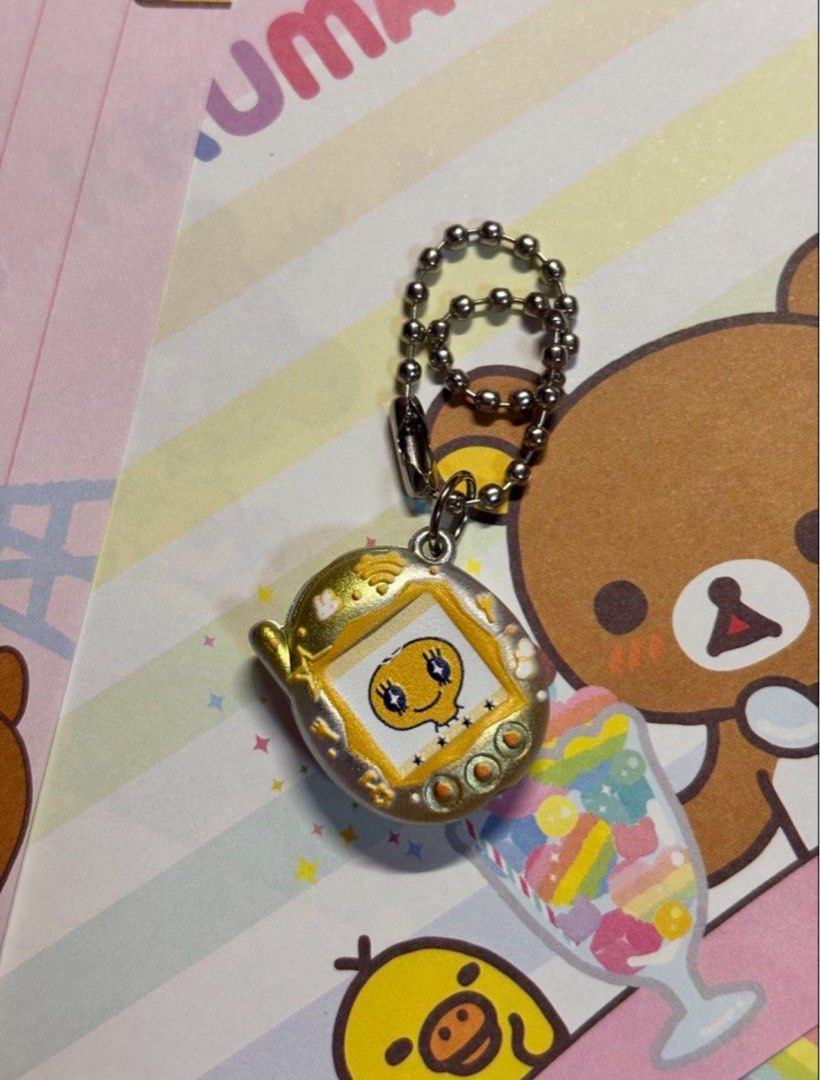 Memetchi Tamagotchi Keychain (Category: Vintage Collectibles) located in San Juan City. Submitted by glitznpops.ph (Listing ID 1465953134, Image 1). Description: .