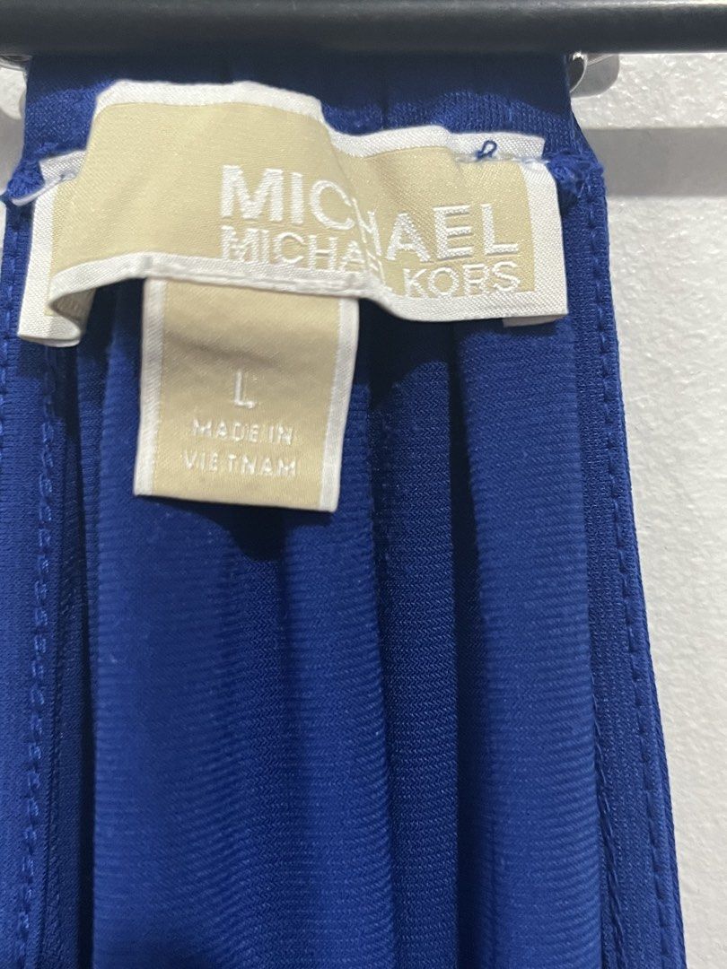 Michael Kors Strappy Blouse (Category: Sleeveless) located in Manila. Submitted by jhcollections (Listing ID 1465842973, Image 3). Description: Michael Kors Strappy Blouse Large on label With stain as shown in the photos Actual photos posted .