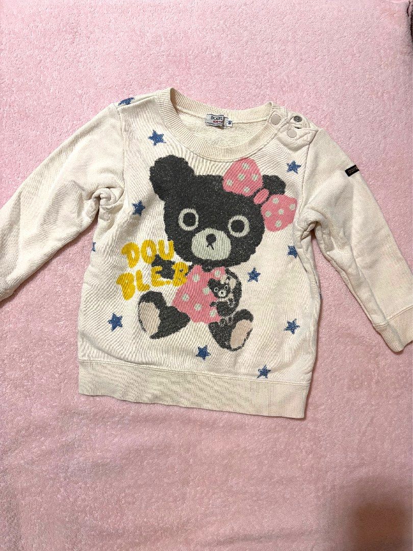 Miki House Double.B sweatshirt (Category: Babies & Kids Fashion) located in Quezon City. Submitted by closettreasure123 (Listing ID 1465846951, Image 1). Description: 1-3yrs old No issue It features a large, textured graphic of B-ko Chan (the signature female black bear character from the Double.B line) wearing a pink polka-dot bow and a matching polka-dot shirt. The background is accented with small blue stars and yellow block text reading “DOUB