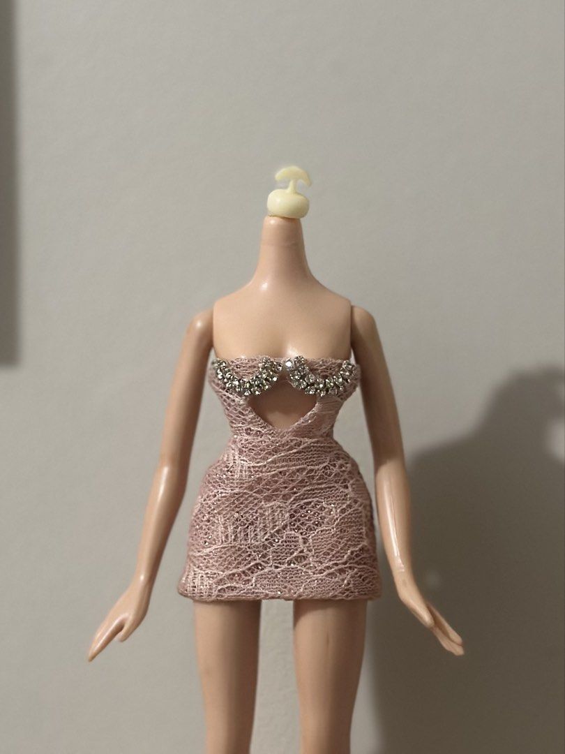 mini dress for bratz (Category: Designer & Blind Box Toys) located in Abucay. Submitted by bratzboy (Listing ID 1465793296, Image 1). Description: custom fully lined dress with crystal chain details closes with metal snaps additional photos upon request 400 plus shipping.