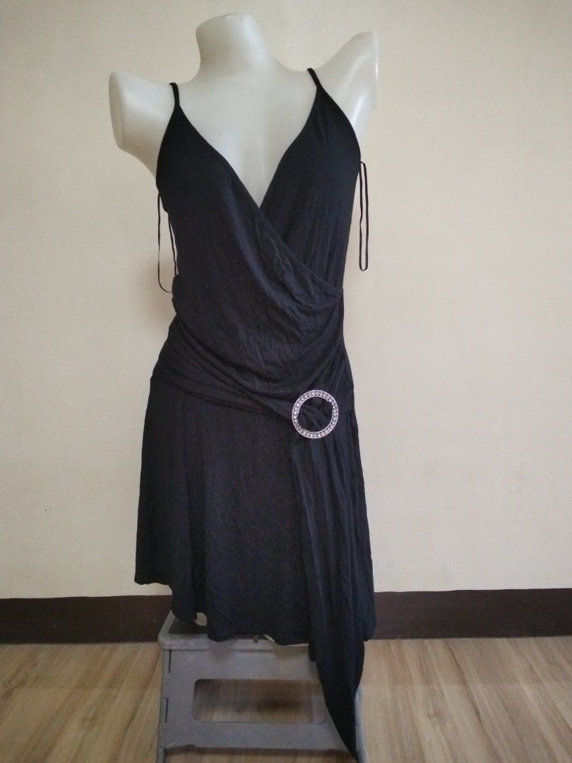 Mini dress spaghetti strap with round ring accent at the hips (Category: Dresses) located in Calasiao. Submitted by alluringvenus.thriftshop (Listing ID 1465799673, Image 1). Description: brand new with tags.