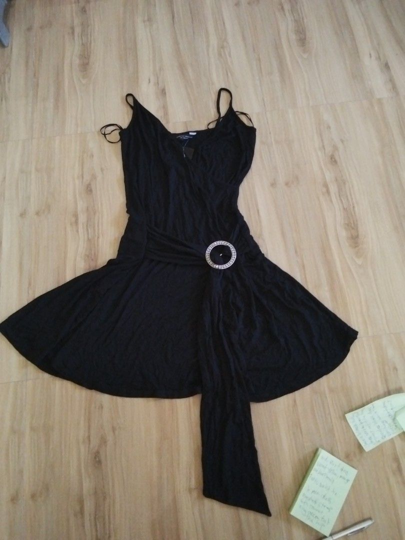 Mini dress spaghetti strap with round ring accent at the hips (Category: Dresses) located in Calasiao. Submitted by alluringvenus.thriftshop (Listing ID 1465799673, Image 3). Description: brand new with tags.