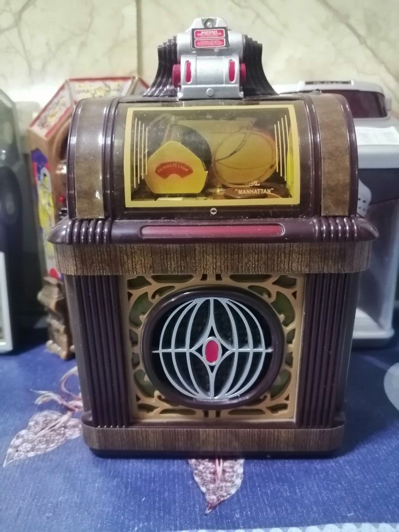 Mini jukebok set 1:12 (5pcs) (Category: Vintage Collectibles) located in Pateros City. Submitted by romferarc333 (Listing ID 1465913594, Image 3). Description: 5 pcs mini Jukebok Height: 4.5 to 5 inches As is. No more sounds and lights. See photos. Good for vintage 1:12 dioramas. Take all. Location :Pateros.