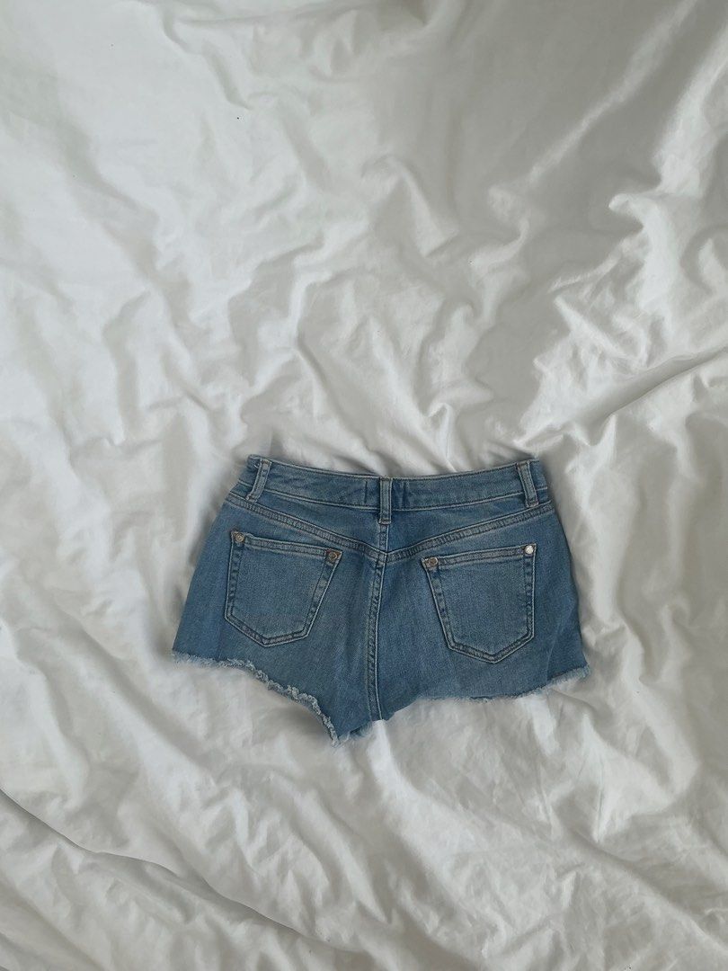 Patchwork Low Rise Denim Mini Shorts (Category: Shorts) located in Taguig. Submitted by babyspice888 (Listing ID 1465780342, Image 2). Description: Miss Selfridge Petite Denim Patchwork Shorts — Discontinued!!! Super cute Y2K-style denim shorts with embroidered rose, butterfly, heart & star patches + distressed/frayed hem. Brand: Miss Selfridge Petites Condition: Barely worn, good condition, no flaws Original Selling price = £30–£40 (₱2400-₱3200)