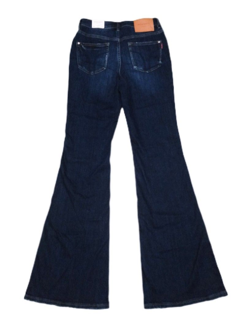 Miss Sixty Flare Dark Wash Jeans (Category: Jeans) located in Manila. Submitted by jaradhiggins24 (Listing ID 1465866813, Image 2). Description: - Brand: Miss Sixty (Est. 1991) - Style: Dark wash denim flare jeans with high-rise waist - Details: Contrast yellow stitching, distressed coin pocket with red logo tag, and leather back patch - Closure: Button closure and zipper fly - Condition: Brand new with original tags attached.
