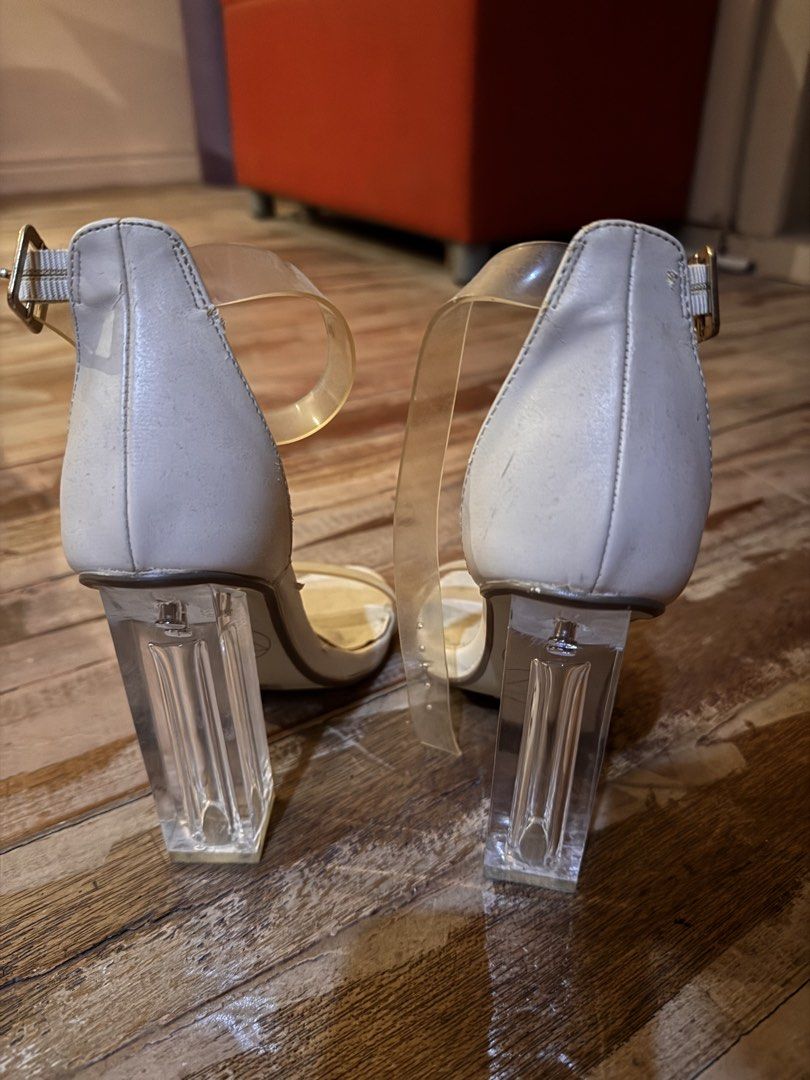 Missguided Clear Block Heel Sandals (Category: Heels) located in Pasig City. Submitted by klaaaaa (Listing ID 1465878483, Image 3). Description: - Brand: Missguided - Type: Nude heels with clear block heels and transparent ankle strap - Size: UK 3 / EU 36 - Design: Open toe with adjustable ankle buckle fastening - Condition: Soles show minor wear from previous outings, still plenty of life left.