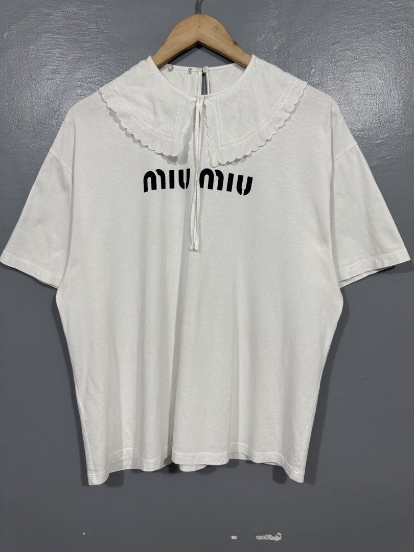 Miu Miu - Macramé Collar Shirt (Category: Shirts) located in Manila. Submitted by sophisticatedgoons (Listing ID 1465871713, Image 2). Description: Miu Miu Macramé Collar Oversized Shirt Size: Fit XL women's Dimes: 22" bust x 27" length In good condition No major flaws like hole and scratches Cut neck label Check pics for details.