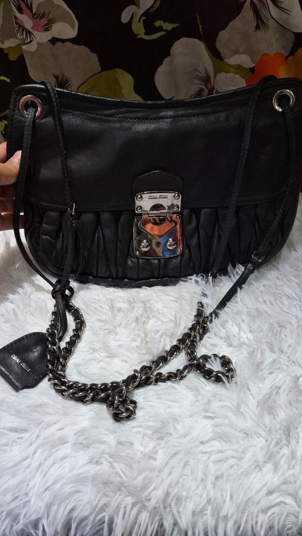 Miu Miu Black Quilted Leather Shoulder Bag (Category: Shoulder Bags) located in Baguio. Submitted by jhaz_bags (Listing ID 1465821090, Image 1). Description: no major flaws no rubs sa body strap nice pa in good condition auth.