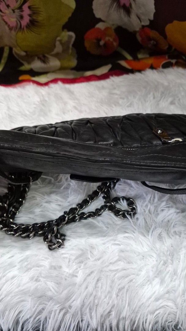 Miu Miu Black Quilted Leather Shoulder Bag (Category: Shoulder Bags) located in Baguio. Submitted by jhaz_bags (Listing ID 1465821090, Image 2). Description: no major flaws no rubs sa body strap nice pa in good condition auth.