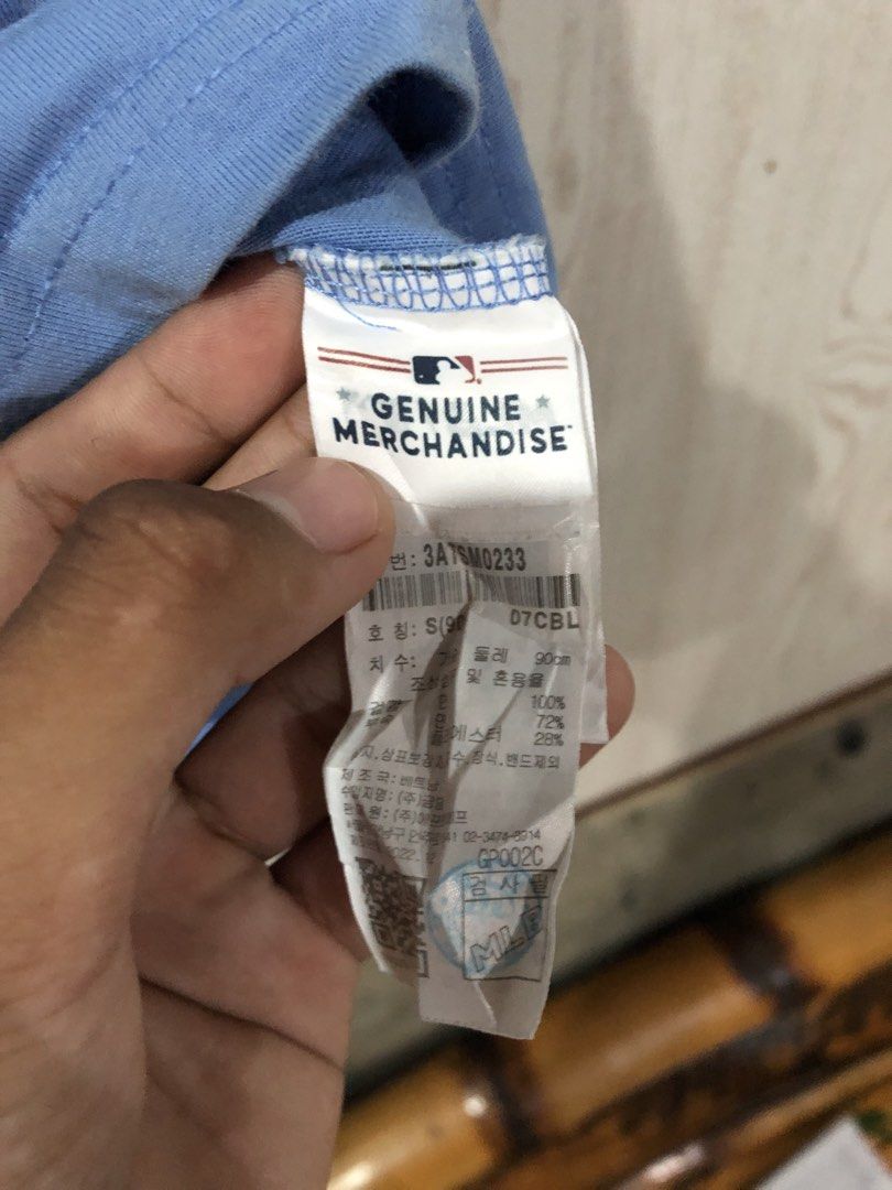 MLB LA Dodgers Light Blue T-Shirt (Category: Tshirts & Polo Shirts ) located in Magsaysay. Submitted by ryns_thrifting (Listing ID 1465896141, Image 3). Description: - Brand: MLB (Genuine merchandise tag attached) - Team: LA Dodgers - Color: Light Blue - Size: S - Material: Clean, comfortable cotton - Design: Embroidered Dodgers logo on front chest, large graphic print with small logos on the back - Fit: Short sleeves with classic crew neckline.