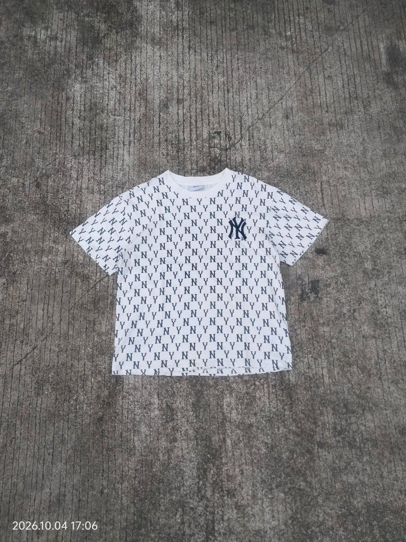 MLB New York Yankees All Over Print (Category: Tshirts & Polo Shirts ) located in Caloocan City. Submitted by haruconcep52476 (Listing ID 1462448160, Image 1). Description: Dimensions W20.5×L25.5 Good condition Color rate 9 Issue need wash / yellow stain - White t-shirt with all-over NY Yankees print - Classic NY logo prominently displayed on the chest - Made from comfortable, breathable fabric - Ideal for any dedicated New York Yankees fan - Ver