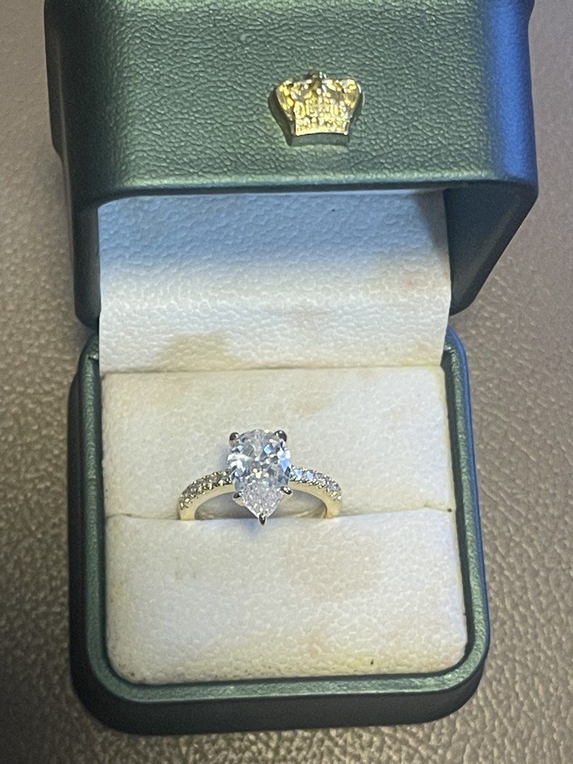 Moissanite Pear ring (Category: Luxury Accessories) located in Bulacan. Submitted by grazcloset (Listing ID 1465880450, Image 1). Description: Size 7 .