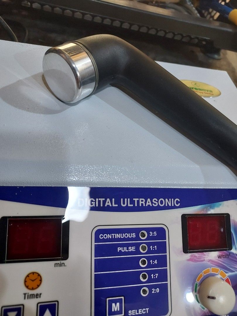 Moreanva Digital Ultrasonic Physiotherapy Device 1MHz (Category: Medical Supplies & Tools) located in Las Pinas. Submitted by jerri44 (Listing ID 1465808448, Image 2). Description: - Brand: Moreanva Digital Ultrasound Therapy Device - Frequency: 1MHz for effective physiotherapy sessions - Display: Clear digital screens showing intensity levels and timer minutes - Modes: Continuous and pulse modes with ratio selections (3:5, 1:1, 1:4, 1:7, 2:0) - 