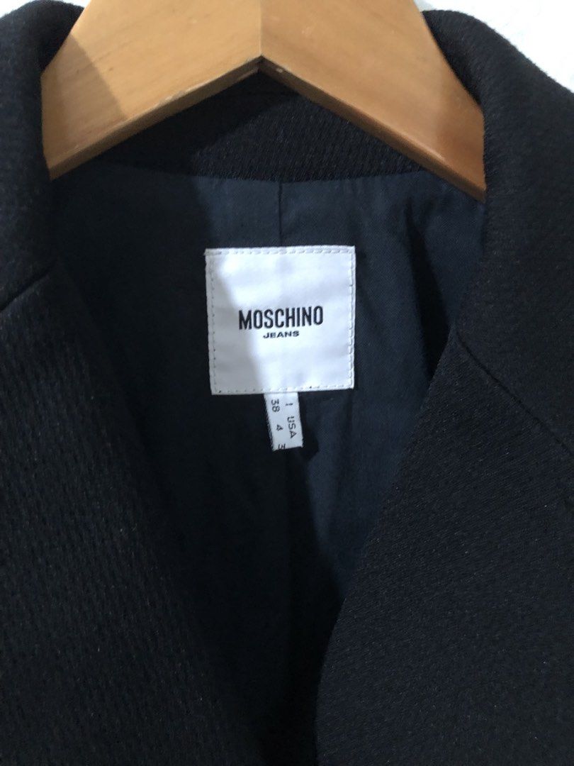 Moschino Long Coat (Category: Coats, Jackets and Outerwear) located in Puerto Princesa. Submitted by vanjagmis (Listing ID 1465848316, Image 3). Description: Moschino Long Coat ♻️SIZE: Medium ♻️DIMENSION: 17 x 36 ♻️CONDITION: Excellent ♻️ISSUE: None 💸MINE: 500 Only🏷️ 🚨No return and exchange. 🚨Check all the details and pics before purchasing the item. 🚨Color may vary due to lighting. 🚨Manage your expectations since all items are thrifted. 🚨