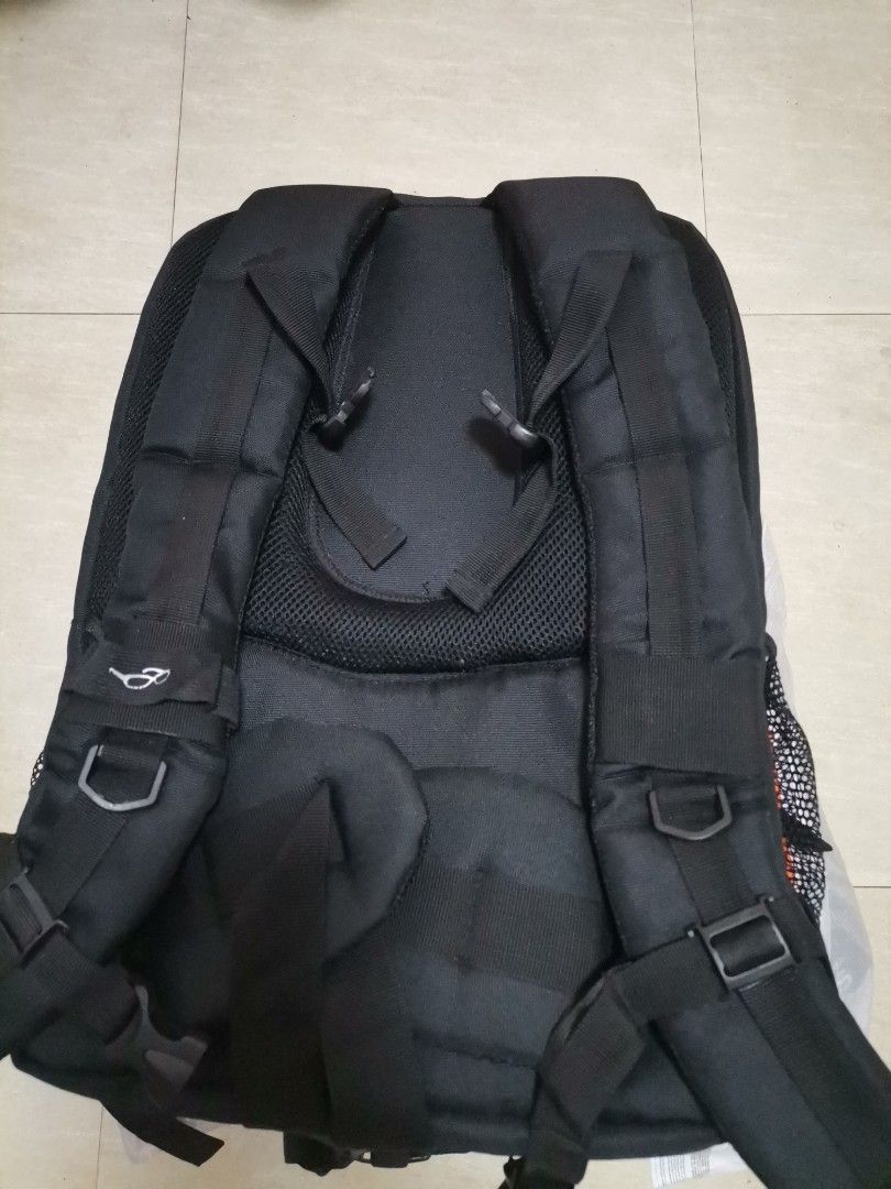 Multistar Elite Black Camera Backpack (Category: Camera Bags & Carriers) located in Makati City. Submitted by kookybearsstuff (Listing ID 1465807678, Image 2). Description: - Multistar Elite professional camera backpack in sleek black with neon yellow accents - Heavy-duty black buckles and secure front straps - Padded mesh shoulder straps complete with a sternum strap and gear loops for comfort - Customizable grey padded interior dividers to safe