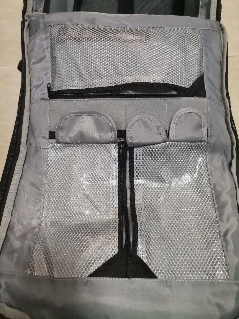 Multistar Elite Black Camera Backpack (Category: Camera Bags & Carriers) located in Makati City. Submitted by kookybearsstuff (Listing ID 1465807678, Image 3). Description: - Multistar Elite professional camera backpack in sleek black with neon yellow accents - Heavy-duty black buckles and secure front straps - Padded mesh shoulder straps complete with a sternum strap and gear loops for comfort - Customizable grey padded interior dividers to safe