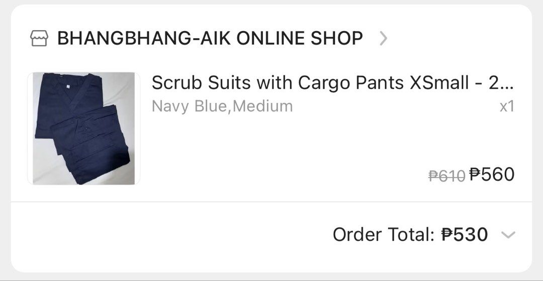Navy Blue Scrub Suit with Cargo Pants Size S (Category: Sets or Coordinates) located in Cavite. Submitted by zhidneygrace (Listing ID 1465901399, Image 2). Description: - Color: Navy blue - Size: Medium (tag attached) - Condition: Unworn, neatly folded - Top: V-neck with short sleeves - Pants: Cargo style with side utility pockets - Perfect for healthcare professionals looking for comfort and functionality Rfs: doesnt fit me.