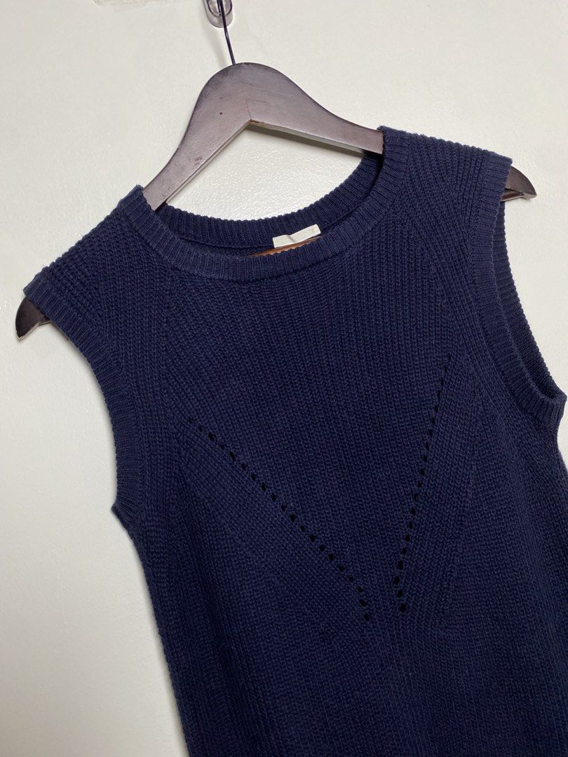 Navy thick knit vest (Category: Others Tops) located in Makati City. Submitted by indaysukaycloset (Listing ID 1465855486, Image 2). Description: NAVY THICK KNIT VEST Brand: Japan Brand Size: S on tag - Fits S-M Color: Navy Blue / Dark Blue Details: - W-15 Front L-24 Back L-27 (laid flat, in inches) - long back - Round neck sleeveless knit vest - V-shaped eyelet / pointelle design in front - Side slits at hem, ribbed neckline & hem - Thick, makap