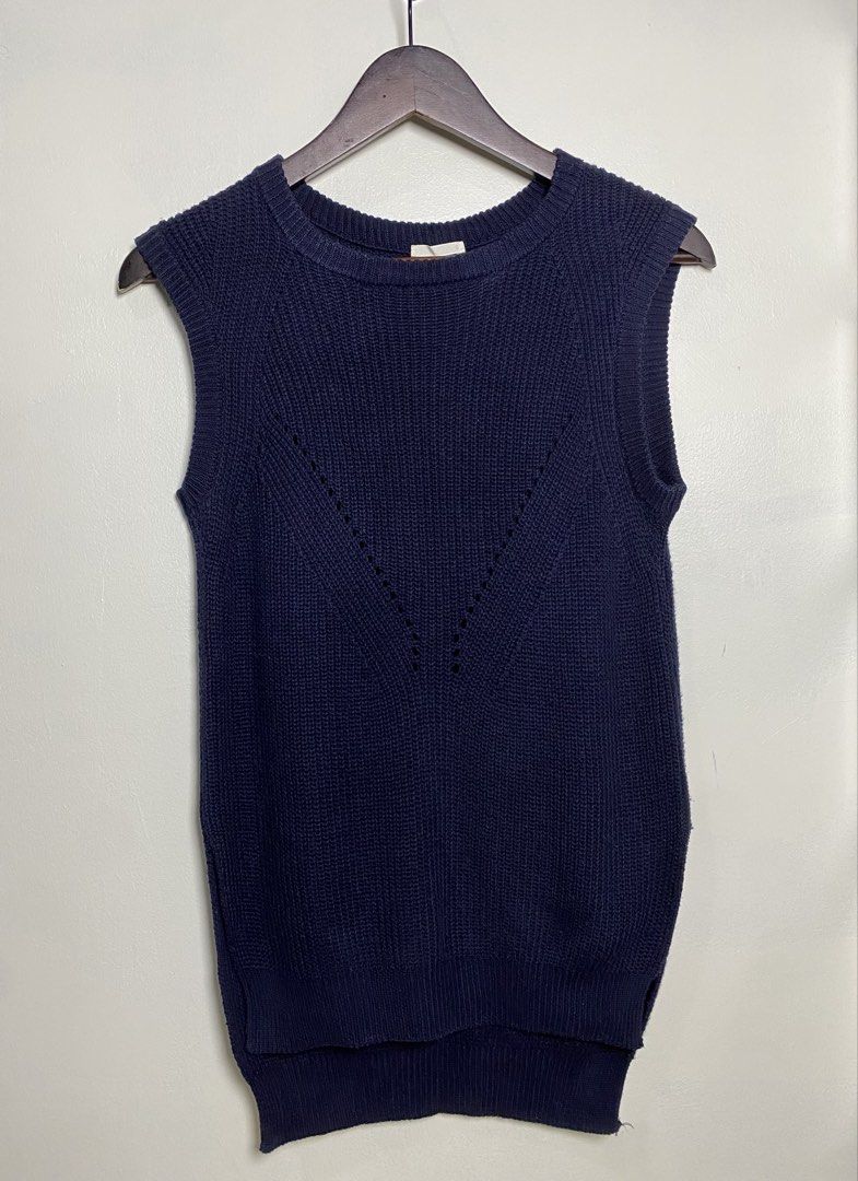 Navy thick knit vest (Category: Others Tops) located in Makati City. Submitted by indaysukaycloset (Listing ID 1465855486, Image 1). Description: NAVY THICK KNIT VEST Brand: Japan Brand Size: S on tag - Fits S-M Color: Navy Blue / Dark Blue Details: - W-15 Front L-24 Back L-27 (laid flat, in inches) - long back - Round neck sleeveless knit vest - V-shaped eyelet / pointelle design in front - Side slits at hem, ribbed neckline & hem - Thick, makap