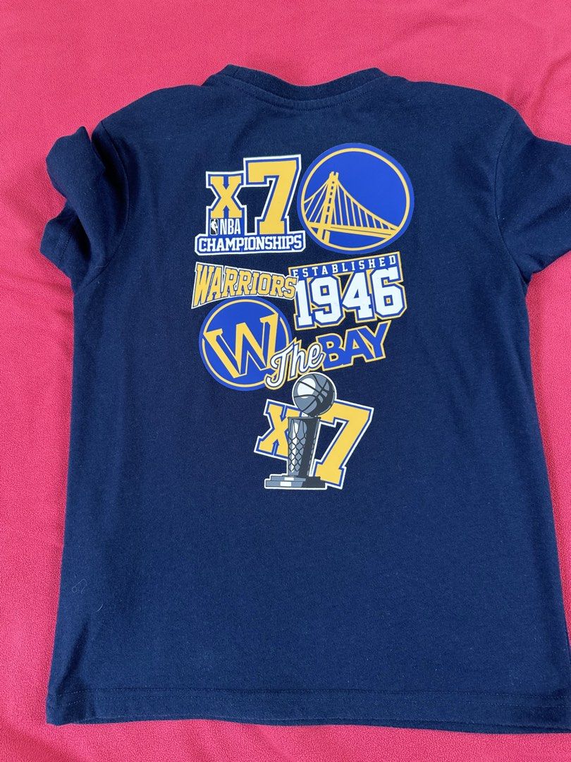 NBA Golden State Warriors Tee (Category: Babies & Kids Fashion) located in Batangas. Submitted by forrestfinds25 (Listing ID 1465772140, Image 3). Description: Size: 10 (kids) Condition: Pre-loved, good condition. Prints are intact, with front and back graphics (x7 Championships)..