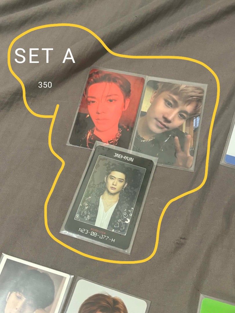 NCT Photocards Sets (Category: K-Wave Merchandise) located in Caloocan City. Submitted by sophiasara55546 (Listing ID 1465912557, Image 2). Description: - Official NCT photocard bundles available in Sets A, B, C, and D - Exo Photocard - Features members: Taeyong, Jaehyun, Yuta, Haechan, and Jisung - Includes a mix of album inclusions, ID cards, and polaroids - All photocards come with protective clear sleeves - Selling as sets only (prices indica