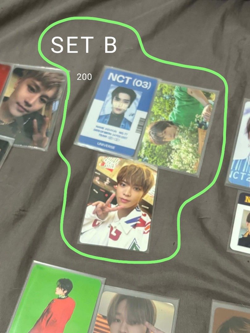 NCT Photocards Sets (Category: K-Wave Merchandise) located in Caloocan City. Submitted by sophiasara55546 (Listing ID 1465912557, Image 3). Description: - Official NCT photocard bundles available in Sets A, B, C, and D - Exo Photocard - Features members: Taeyong, Jaehyun, Yuta, Haechan, and Jisung - Includes a mix of album inclusions, ID cards, and polaroids - All photocards come with protective clear sleeves - Selling as sets only (prices indica