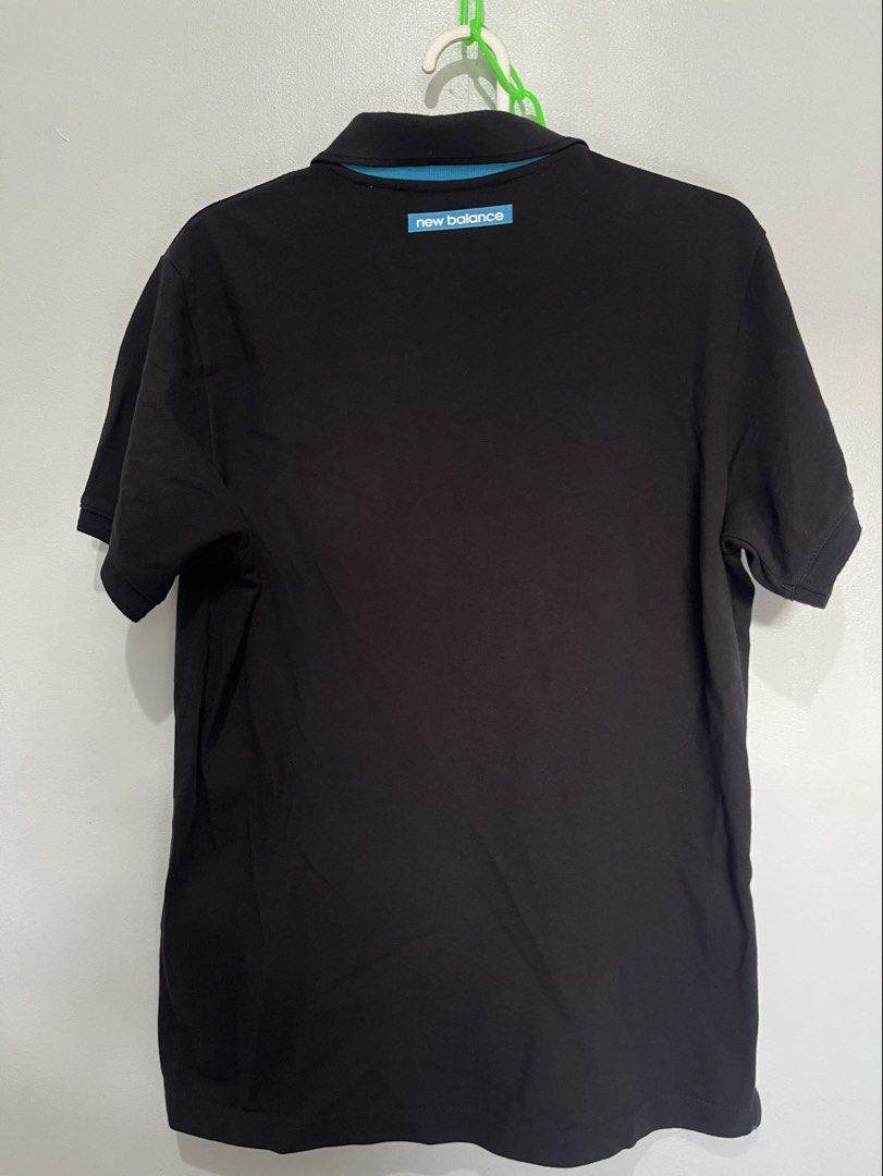 New balance golf polo shirt (Category: Activewear) located in Cebu City. Submitted by thrift.sht (Listing ID 1465829879, Image 2). Description: New balance golf polo shirt Size: medium to large Color rate: 9.8/10 Excellent condition No issue Need wash 📍cebu city.