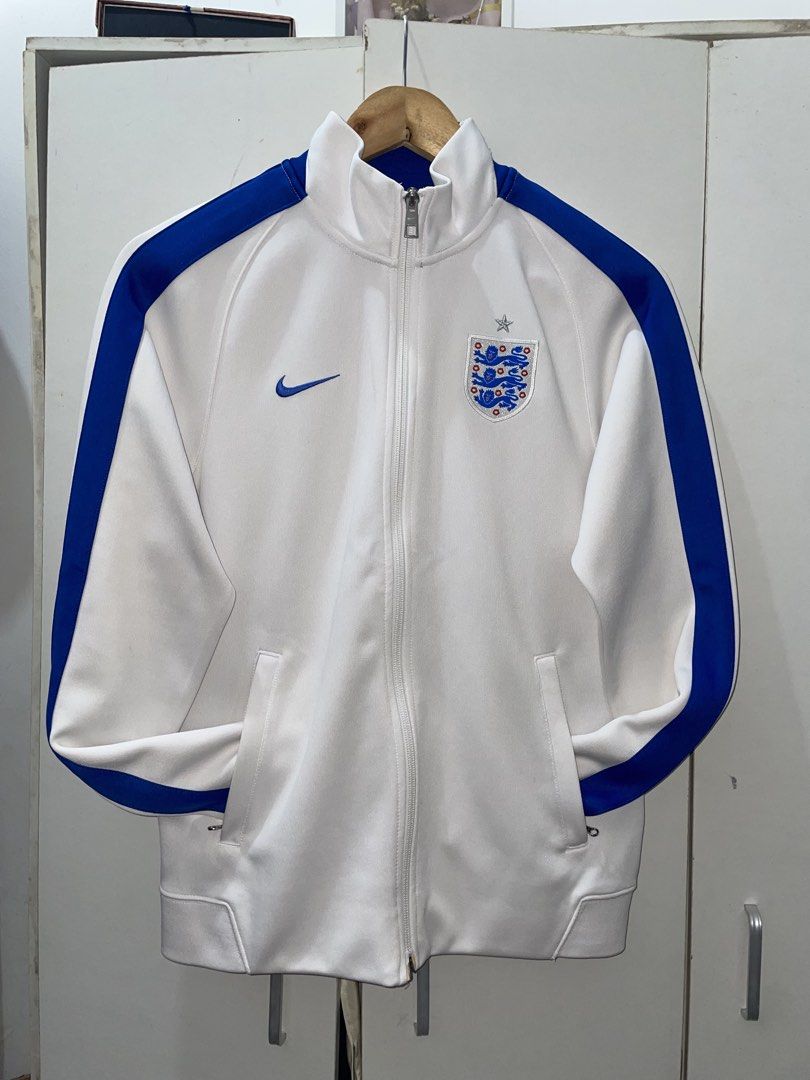 Nike 2014-2015 England Sideline Track Jacket Vintage (Category: Coats, Jackets and Outerwear) located in Caloocan City. Submitted by lawrcity (Listing ID 1465875673, Image 1). Description: Nike 2014-2015 England Sideline Track Jacket, Blue, Limited Edition, Medium size, Good condition, No stains, Negotiable.