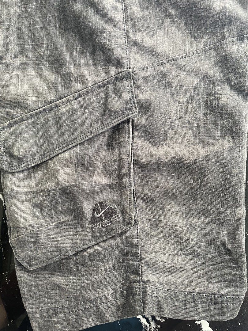 Nike ACG Cargo Shorts Camo Grey (Category: Shorts) located in Catigbian. Submitted by ekong_yeager (Listing ID 1464666172, Image 2). Description: - Grey Nike ACG cargo shorts - Subtle camouflage pattern - Multiple storage pockets - Button and zip fly closure - Ideal for outdoor activities and casual wear - Comfortable fit Vintage Nike ACG Cargo Short Price: 850+shipping fee Excellent condition Color rate 9/10 No issue Fresh from bale Washed and r