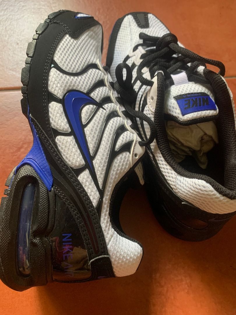 Nike Air Max Torch 4 White Blue Black (Category: Sneakers) located in Quezon City. Submitted by armicg (Listing ID 1465772921, Image 3). Description: - Authentic Nike Air Max Torch 4 sneakers - Colorway: White mesh upper with black overlays and royal blue swoosh details - Design: Classic lace-up front with black laces and blue tongue patch accents - Cushioning: Visible Air Max unit in the heel for maximum comfort - Versatile: Perfect for daily ca