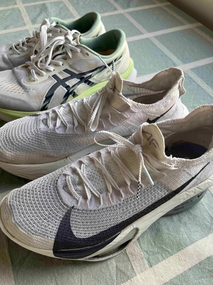 Nike and Asics Running Shoes Bundle (Category: Activewear) located in Caloocan City. Submitted by _skea (Listing ID 1465897428, Image 1). Description: 👟Nike Alphafly 3 "Gridiron" Size: 12 (TTS) Mileage: 131.49 km Price: P4,500 ✅ Race day shoes 👟ASICS Magic Speed 4 "White Blue Expanse" Size: 12.5 (narrow sizing, fits US12) Mileage: 257.87 km Price: P3,500 ✅Good for tempo or speedy long runs ✅Grippy outsole (ASICSGRIP) RFS: Decluttering Slightly 