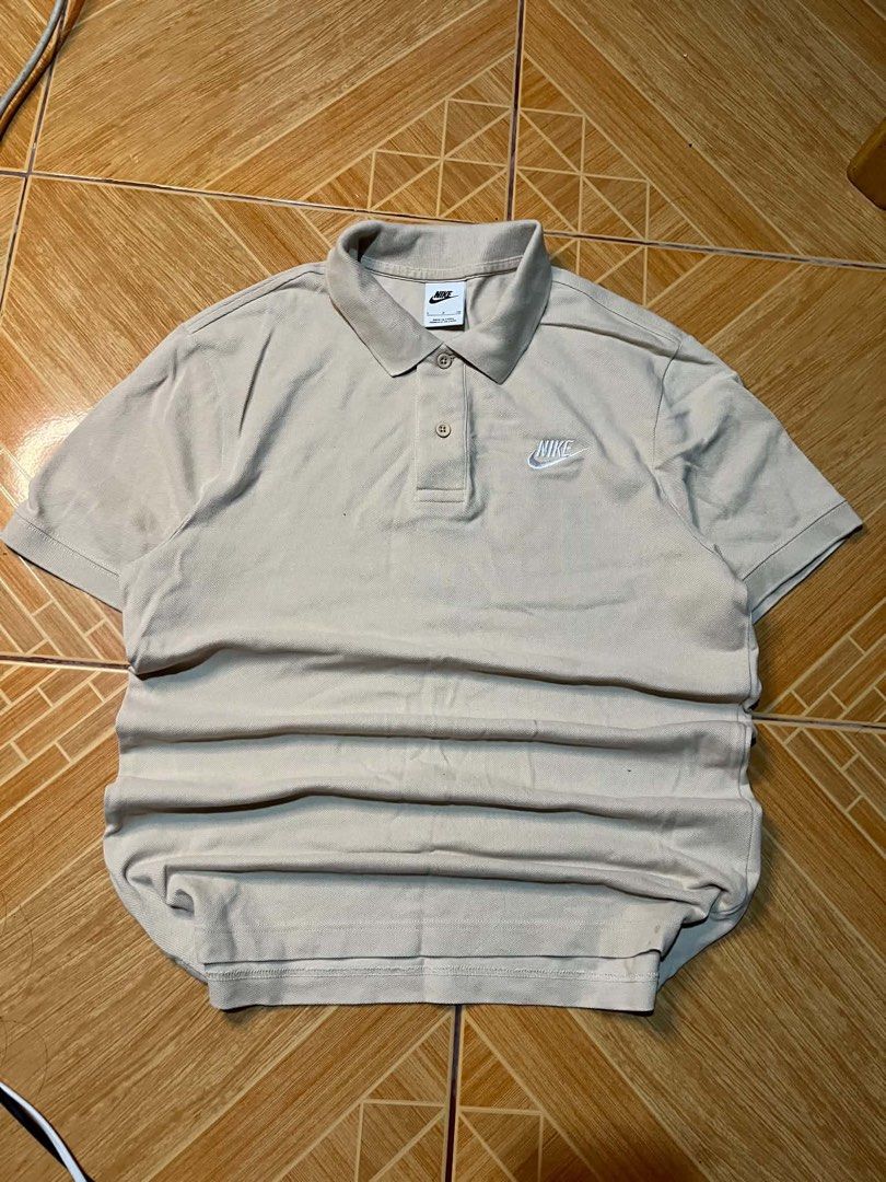 Nike Beige Polo Shirt (Category: Tshirts & Polo Shirts ) located in San Marcelino. Submitted by SoloMain (Listing ID 1465945821, Image 1). Description: - Authentic beige Nike polo shirt - 20 by 27 - for more details dm me.