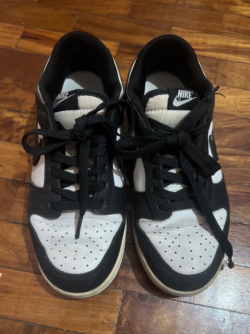 Nike Dunk Low Panda Black White (Category: Sneakers) located in Manila. Submitted by kaceylgt (Listing ID 1465943917, Image 2). Description: - Model: Nike Dunk Low 'Panda' (Black & White) - Style: Classic monochrome leather upper with iconic black overlays and swoosh - Condition: Pre-owned with visible wear on the midsoles and toe box creasing - Fit/Vibe: Ultimate everyday streetwear staple - Inclusions: Shoes only (no box).
