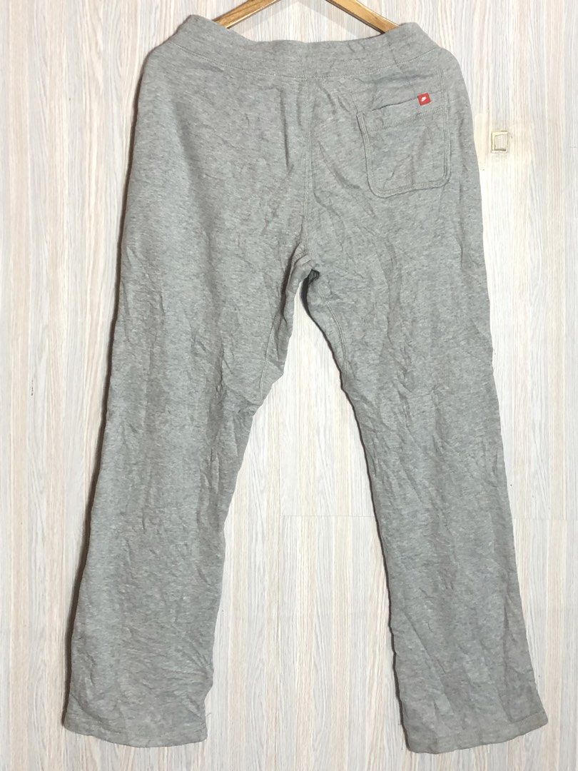 Nike Grey Sweatpants XL Size 34 (Category: Joggers) located in Montevista. Submitted by rdthriftshub (Listing ID 1465873589, Image 3). Description: - Brand: Nike - Color: Grey with white embroidered logo - Size: XL (Waist: 34", Length: 39") - Features: Adjustable black drawstring, convenient back pocket with red tag - Origin: Made in China - Condition: Perfect for casual everyday wear or cozy lounging.