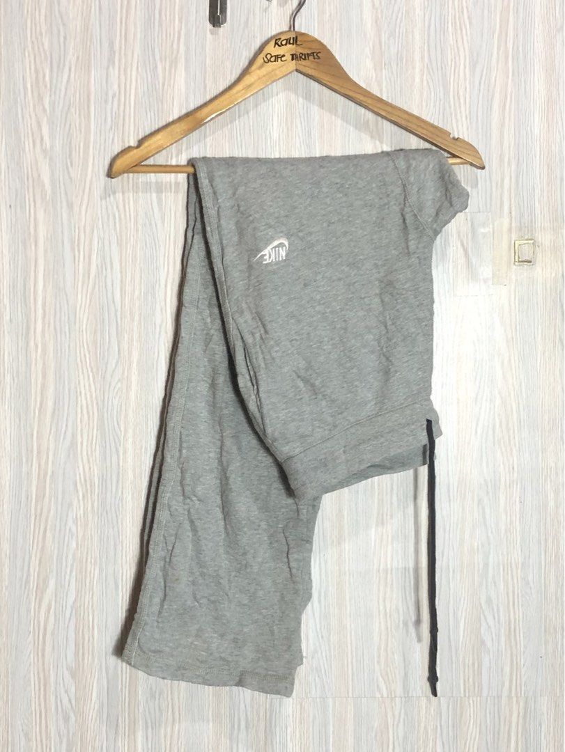 Nike Grey Sweatpants XL Size 34 (Category: Joggers) located in Montevista. Submitted by rdthriftshub (Listing ID 1465873589, Image 1). Description: - Brand: Nike - Color: Grey with white embroidered logo - Size: XL (Waist: 34", Length: 39") - Features: Adjustable black drawstring, convenient back pocket with red tag - Origin: Made in China - Condition: Perfect for casual everyday wear or cozy lounging.