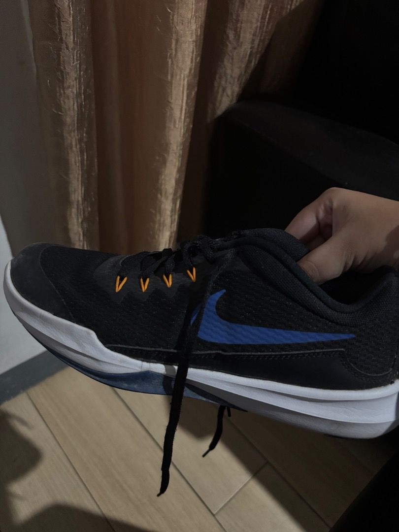 Nike Men's Training Shoes Black Size 8 (Category: Sneakers) located in Caloocan City. Submitted by mishaa2603 (Listing ID 1465892214, Image 2). Description: - Brand: Nike Training Shoes - Colorway: Black with Blue Swoosh and Orange accents - Size: US 8 / UK 7 / EUR 41 / CM 26 - Model Code: 924206-007.