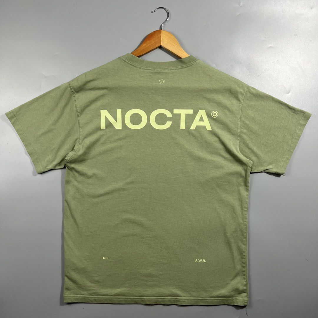 Nike Nocta NRG Tee (Category: Activewear) located in Los Banos. Submitted by 4030.archives. (Listing ID 1465803481, Image 1). Description: Nike Nocta NRG Tee 1800 Pesos Large Length : 27 inches Width : 20.5 inches Excellent Condition.