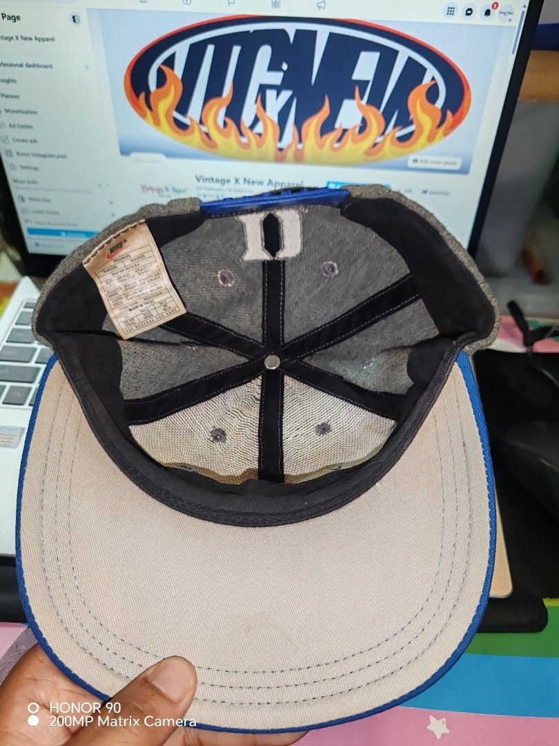 Nike vintage Duke Blue Devils Wool Snapback Hat (Category: Caps & Hats) located in Pasay City. Submitted by markjaysontabuzo (Listing ID 1465872130, Image 2). Description: - Authentic Nike Duke snapback - Grey wool crown with royal blue brim - Large embroidered blue Nike swoosh on front - White collegiate Duke lettering stitched across the bill - Blue snap closure with small embroidered Duke logo at the back - Clean interior lining with original 