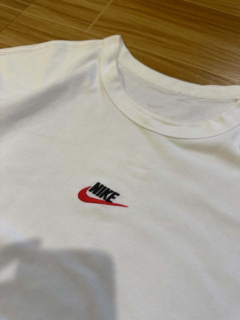 Nike White Shirt with Embroidered Logo (Category: Tshirts & Polo Shirts ) located in Dumaguete. Submitted by shanoyyy (Listing ID 1465840327, Image 3). Description: Size XL on tag Dimes: 23 width x 29 length - Authentic white Nike t-shirt - Classic embroidered Nike logo on the chest - Unique contrasting red stitching along the bottom hem Mode of Payment - Gcash - Gotyme.