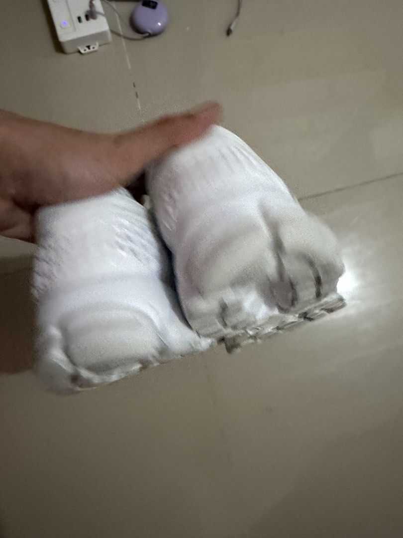 Nike Zoom Vomero 5 White Sneakers (Category: Sneakers) located in Davao. Submitted by fabdeclutter (Listing ID 1465949014, Image 2). Description: - Model: Nike Zoom Vomero 5 (All White) - Upper: Breathable mesh with durable synthetic overlays - Details: Iconic Bowerman series graphic on insoles - Sole: Waffle rubber outsole with very light wear on tread - Condition: Clean laces and padded collar, ready to wear - Style: Comfortable everyday traine
