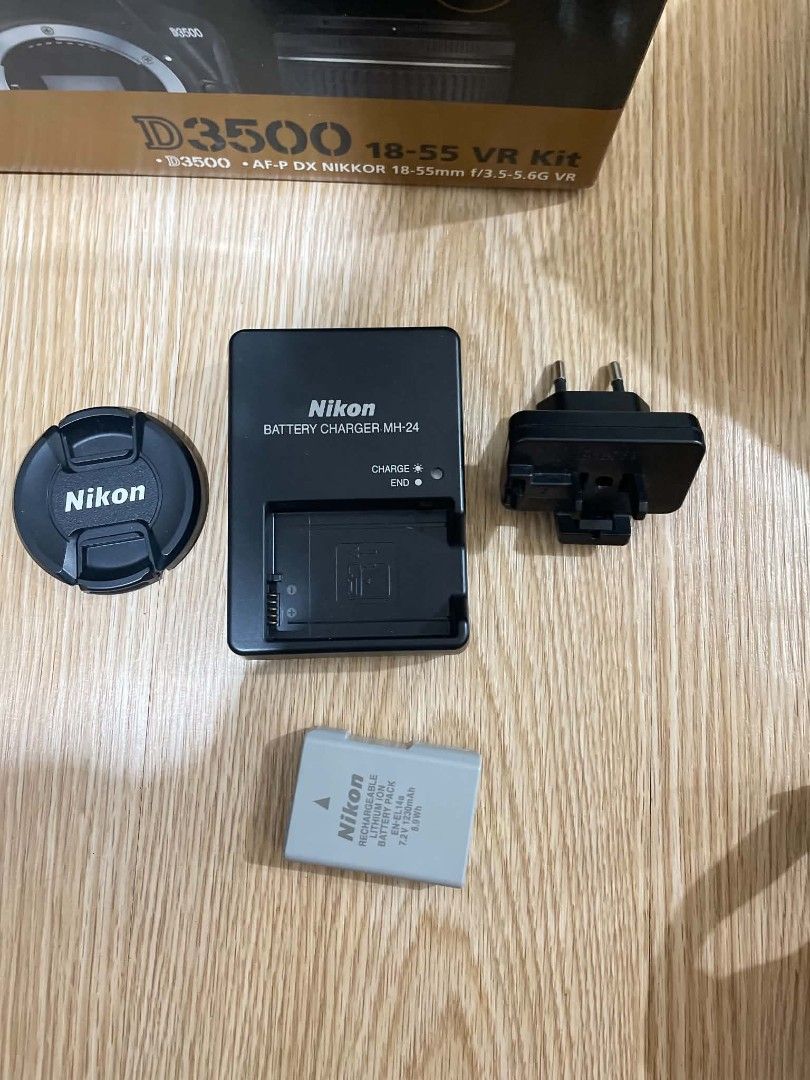 Nikon D3500 DSLR Camera 18-55mm VR Kit (Category: Cameras) located in Caloocan City. Submitted by mariatheresa1994 (Listing ID 1465908455, Image 3). Description: - Nikon D3500 body in clean condition - AF-P DX NIKKOR 18-55mm f/3.5-5.6G VR lens with clean glass - Includes MH-24 battery charger, plug adapter, and EN-EL14a rechargeable battery pack - Comes with lens cap and original box - Ideal and reliable entry-level setup for aspiring photographe
