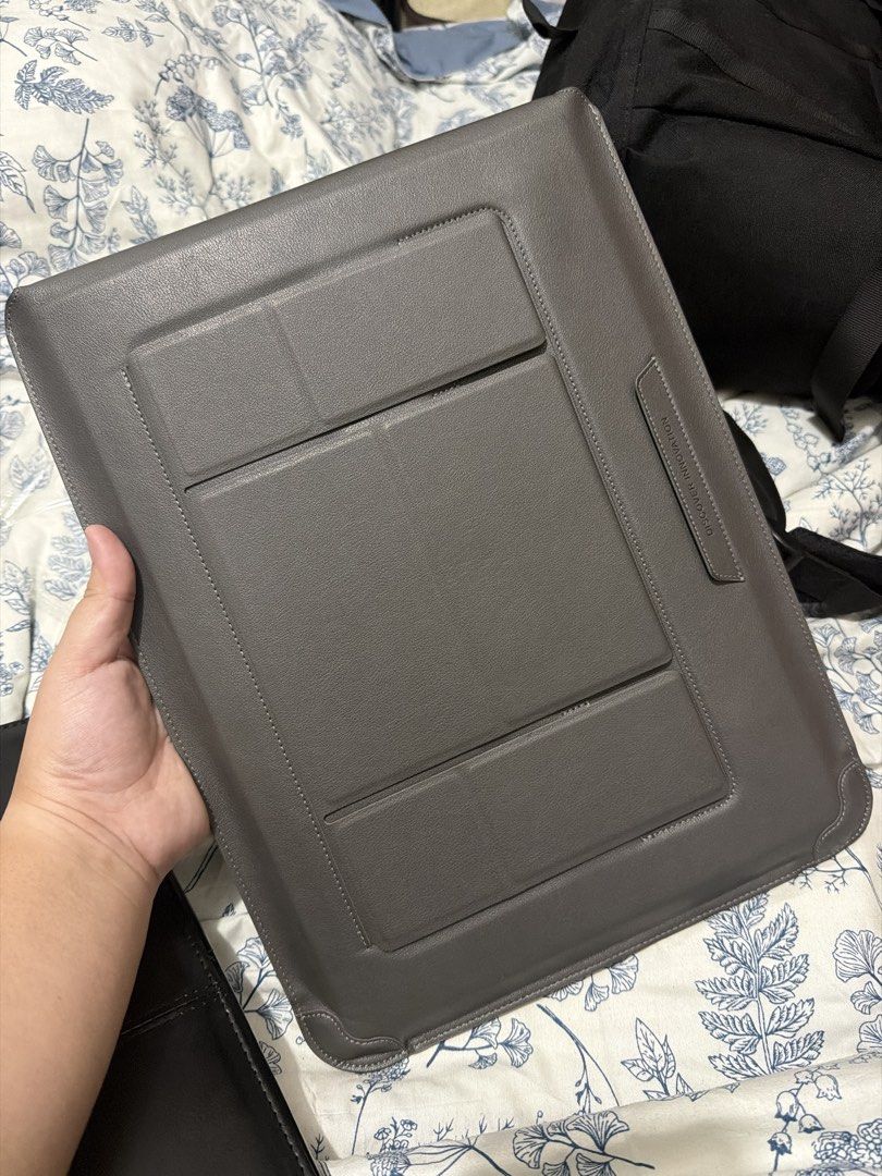 Nilkin 3-in-1 Laptop Sleeve 15-16” (Category: Laptop Bags & Sleeves) located in Manila. Submitted by t13thstreet_og (Listing ID 1445560390, Image 3). Description: Nilkin 3-in-1 Laptop Sleeve ₱600 • with stand & mouse pad • 3-in-1 use • 100% Leather and Velvet inside Issue: small scratch in the front part, can send a photo rfs: already bought a different color to match my stuff. can do same day delivery 📍Manila.