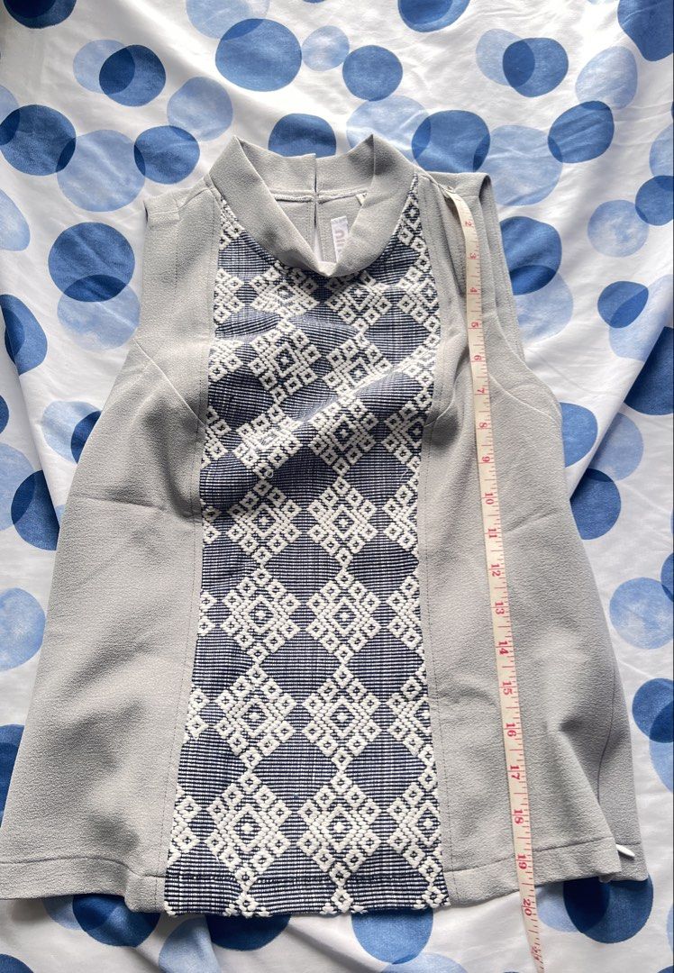 Ninabel Inabel Sleeveless Grey Inabel Front Mock Neck (Category: Sleeveless) located in Quezon City. Submitted by ninanicetohave (Listing ID 1465808131, Image 2). Description: - Style: Sleeveless top with Inabel panel mock neck and back zipper - Design: Inabelcenter pattern - Color: Grey - Size/Measurements: PTP ~15.5 inches, Length ~20 inches - Condition: Excellent, ready to wear!.