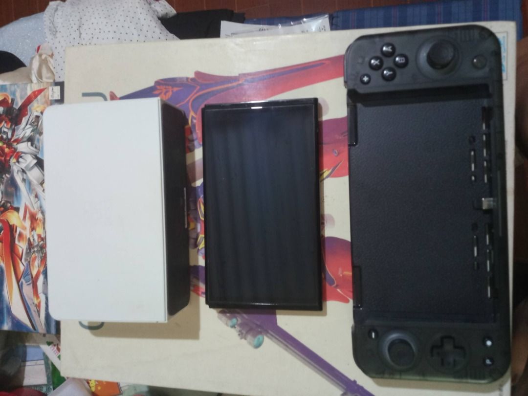 Nintendo Oled switch jailbroken dual boot (Category: Nintendo) located in Quezon City. Submitted by jerrylondoc (Listing ID 1465766475, Image 3). Description: * Selling my Nintendo Oled Switch (Dual Boot) console with complete accessories and 256 SD * Dual boot sya so hindi banned sa eshop and pwede mag online multiplayer * With included games and original peripherals, everything is original including the power adapter, grips, dock and hdmi cable