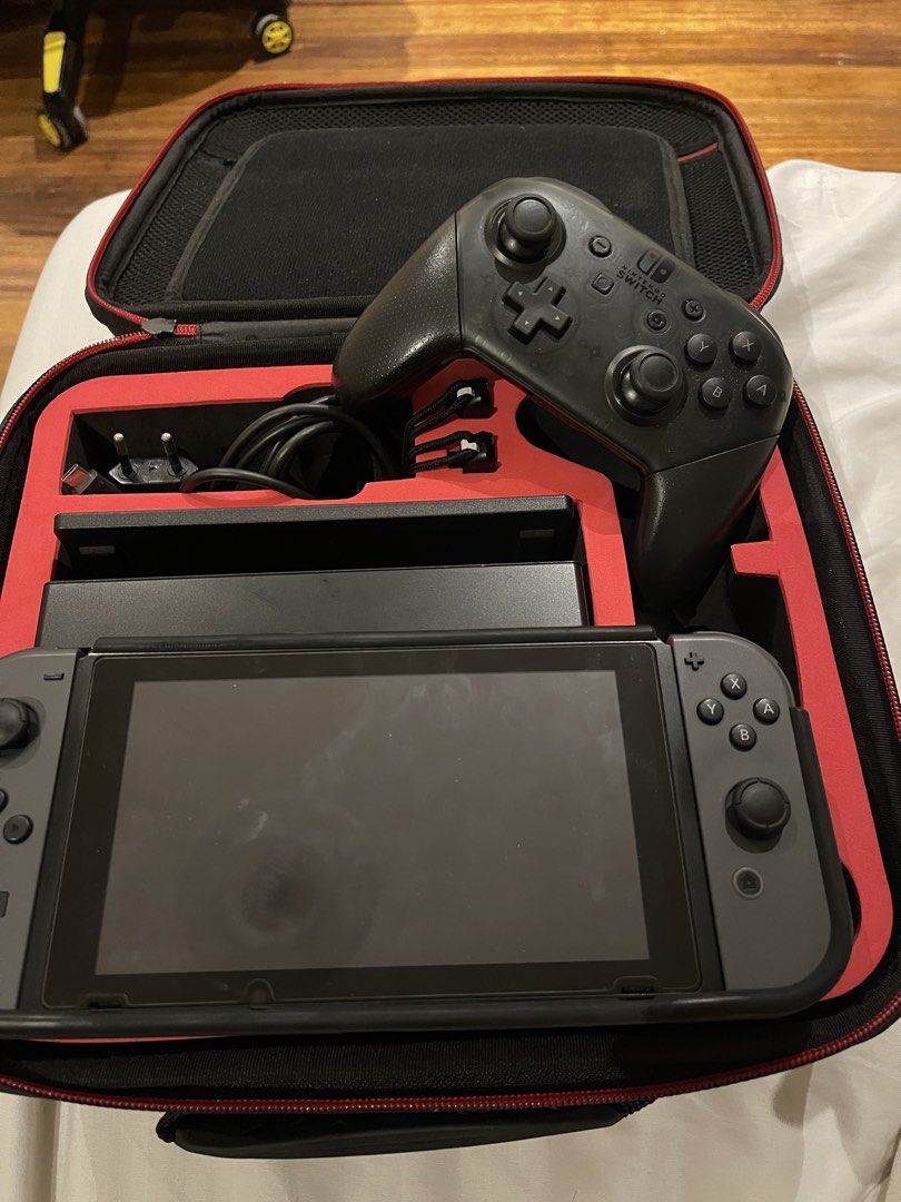 Nintendo Switch Bundle with Pro Controller and Games (Category: Nintendo) located in Manila. Submitted by gihigs (Listing ID 1465939511, Image 1). Description: 🎮 Nintendo Switch Gray Joy-Con Bundle — Barely Used + 2 Games Included! Selling my pre-loved Nintendo Switch (Gray Joy-Cons) bundle! The console is barely used, well taken care of, and fully functional. This is a complete setup with everything you need to play handheld, tabletop, or docke