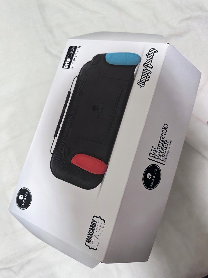 Nintendo Switch Console with Skull & Co Case and Labo VR Kit (Category: Nintendo) located in Quezon City. Submitted by aussomefinds (Listing ID 1465857970, Image 3). Description: - Nintendo Switch Console (Neon Blue/Red Joy-Cons) with original retail box - Skull & Co MaxCarry case and GripCase with extra grip covers - Nintendo Labo Toy-Con 04 VR Kit (Blaster set) - Tempered glass screen protector already applied.